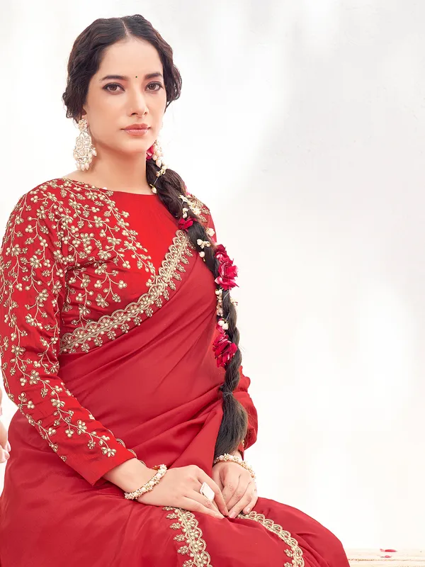 Red party saree in satin with hand work