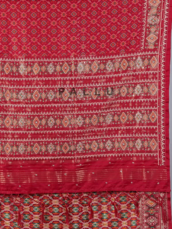 Red patola silk saree with zardosi weaving