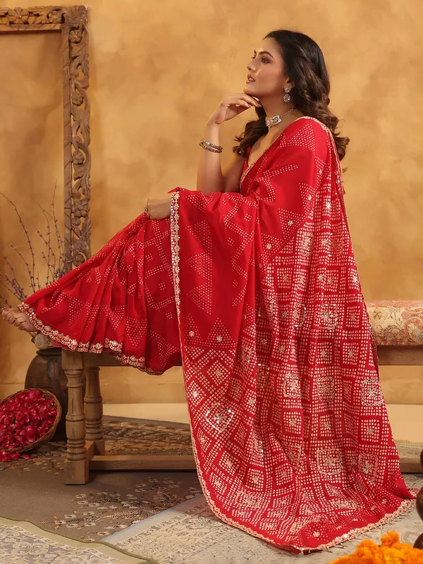 Red printed silk saree for festive wear