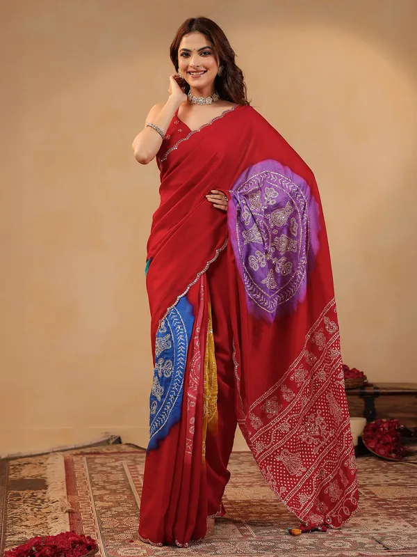 Red printed silk saree with aabla embellishment