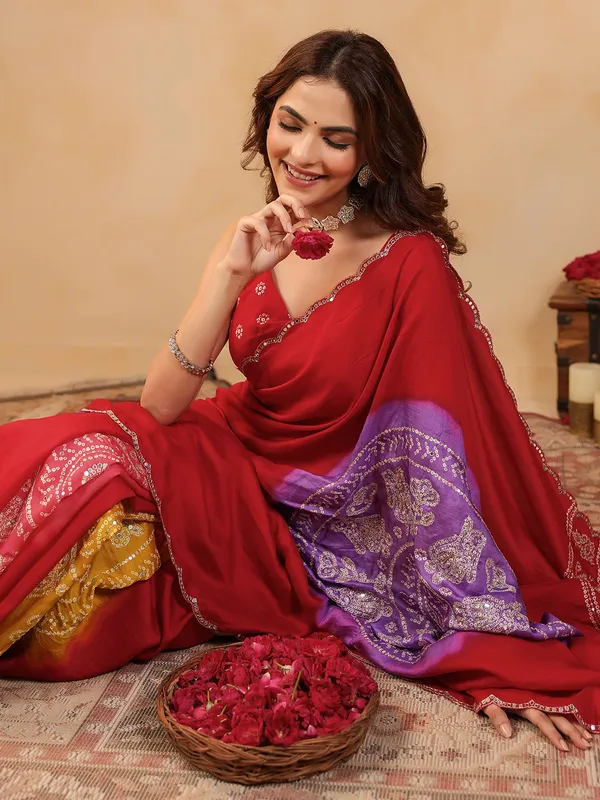 Red printed silk saree with aabla embellishment