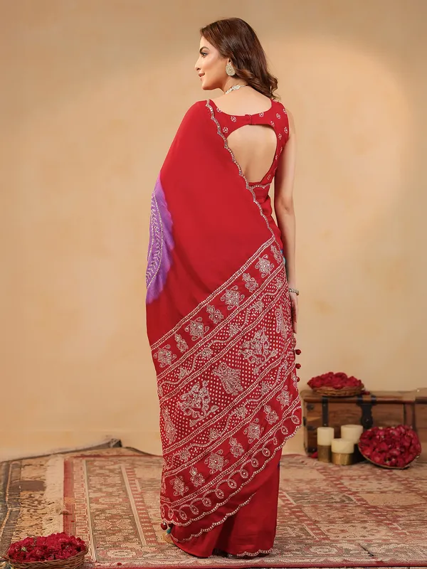 Red printed silk saree with aabla embellishment