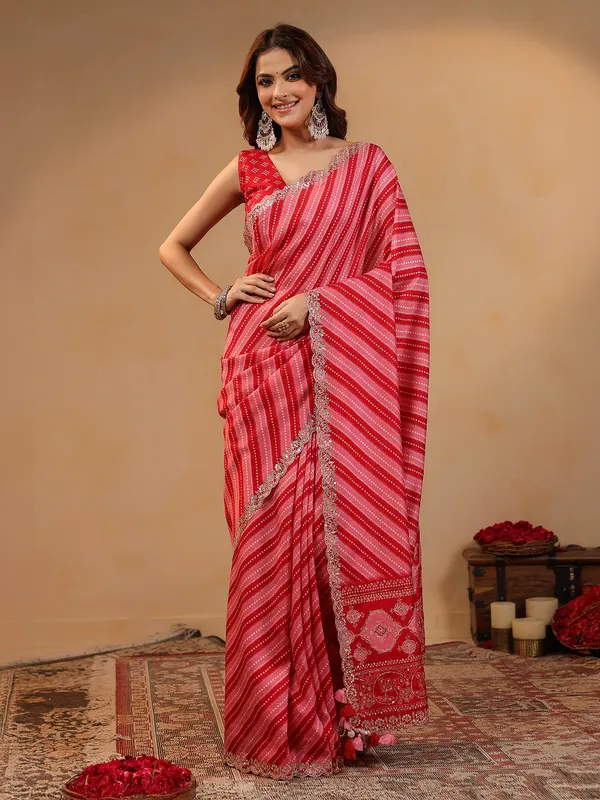Red printed silk saree with gota work