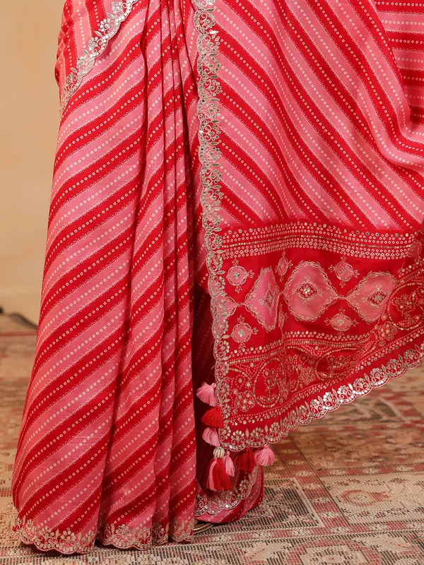 Red printed silk saree with gota work
