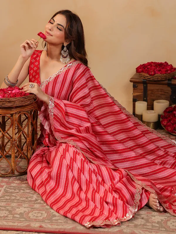 Red printed silk saree with gota work