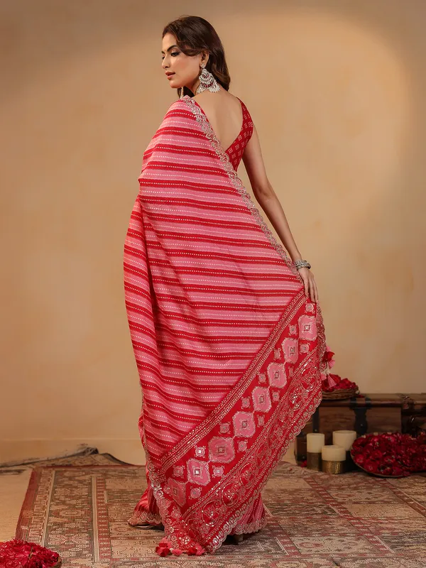 Red printed silk saree with gota work