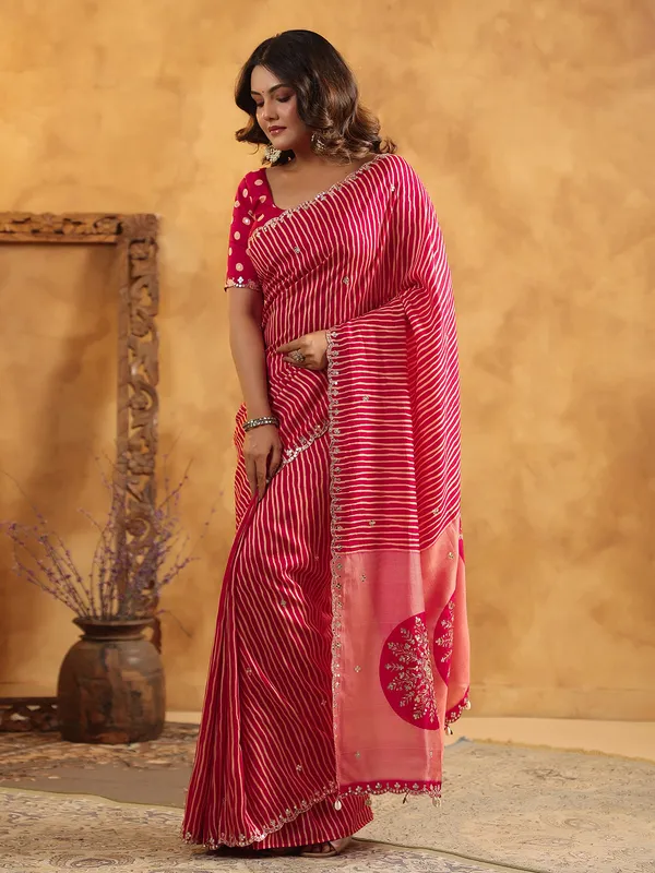 Red printed silk saree with resham and cutdana work