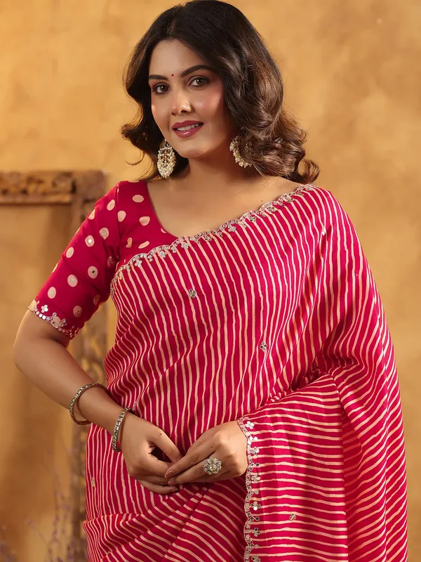 Red printed silk saree with resham and cutdana work
