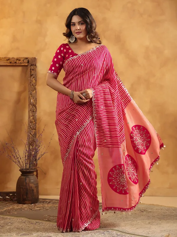 Red printed silk saree with resham and cutdana work