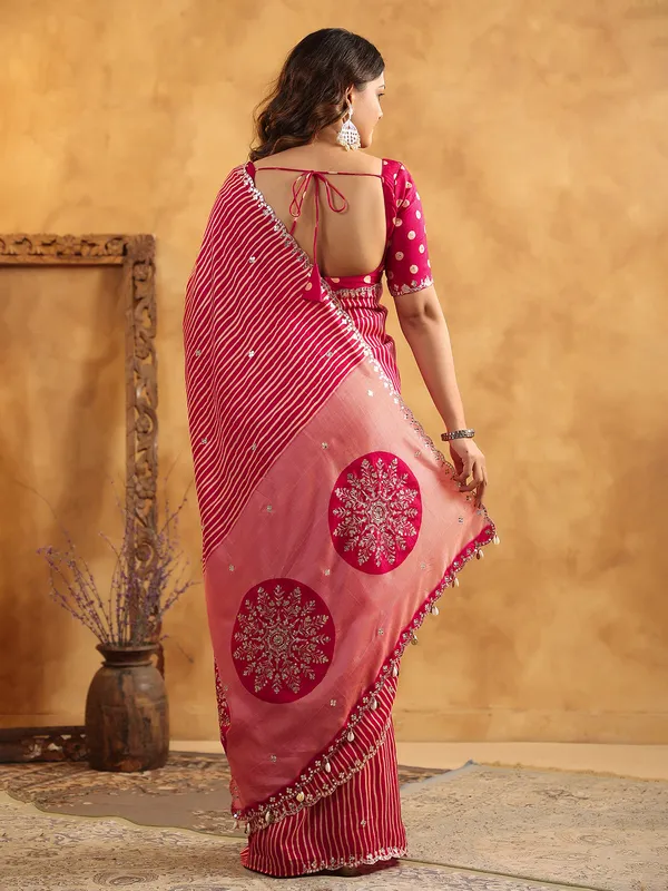 Red printed silk saree with resham and cutdana work
