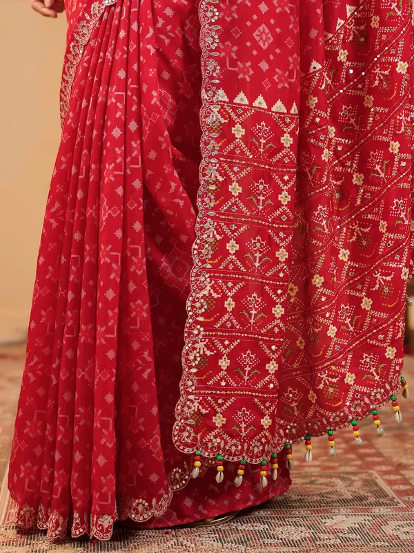 Red printed silk saree with resham embellishment