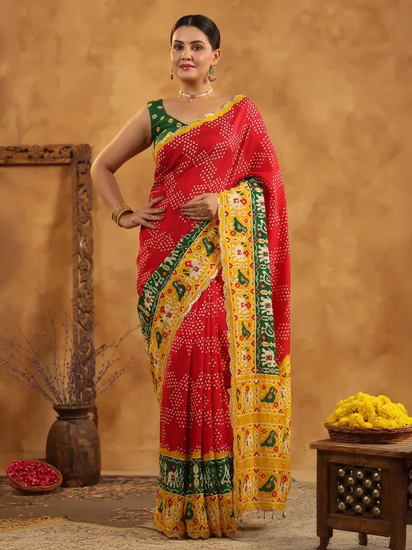 Red printed silk saree with sequins artistry