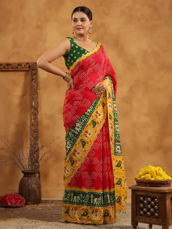 Red printed silk saree with sequins artistry