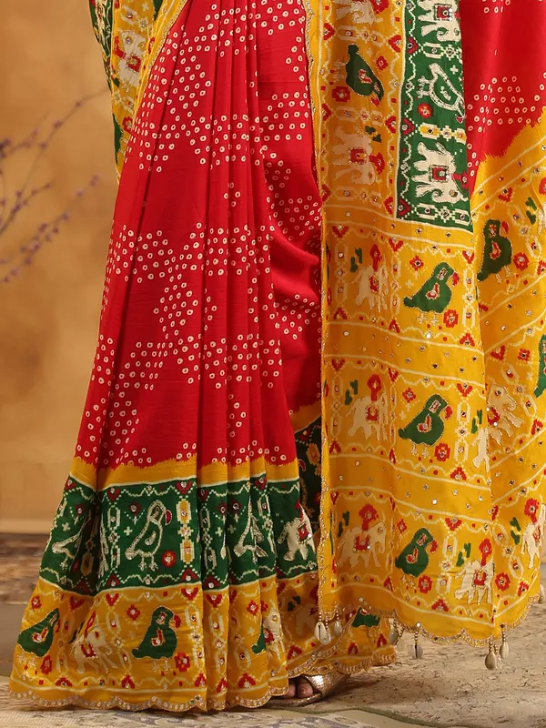 Red printed silk saree with sequins artistry