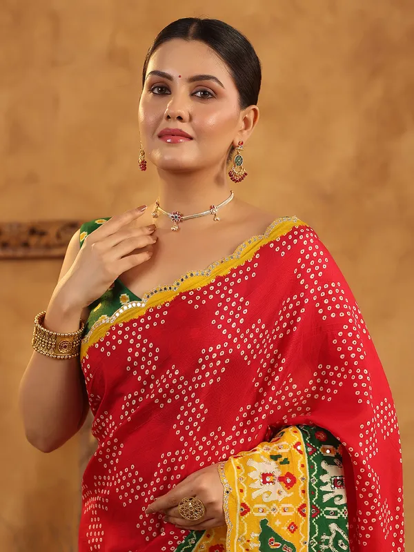 Red printed silk saree with sequins artistry