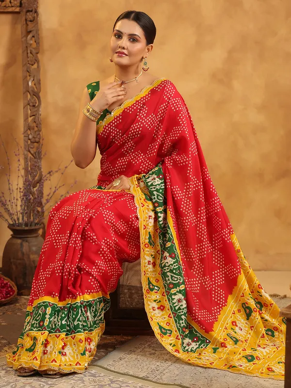 Red printed silk saree with sequins artistry
