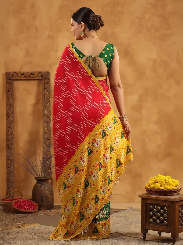 Red printed silk saree with sequins artistry