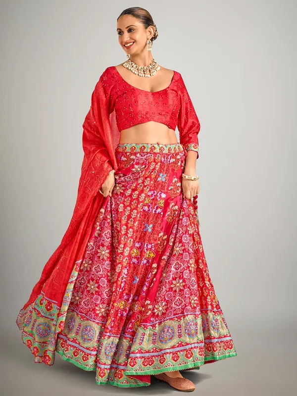 Red printed silk wedding wear lahenga choli