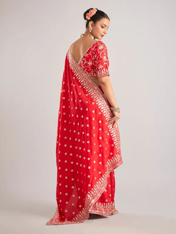 Red pure dola silk saree with beads and resham