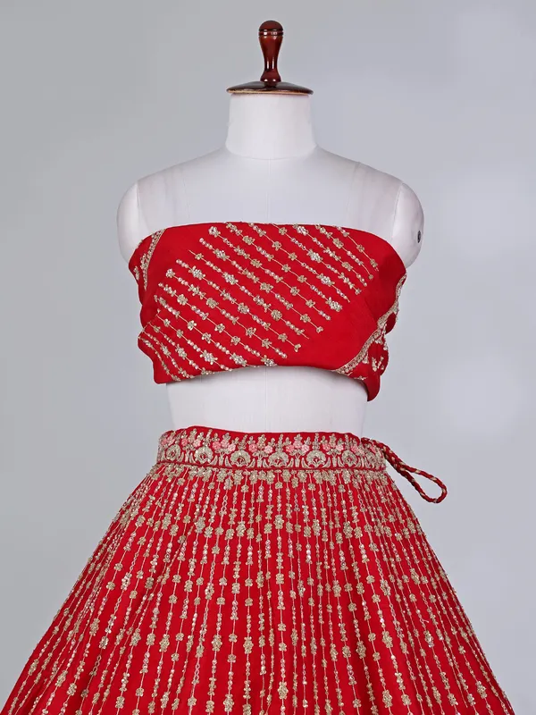 Red raw silk bridal lehenga choli with resham detailing