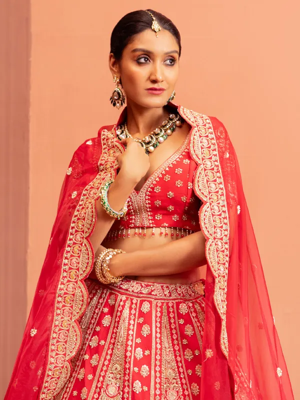 Red raw silk bridal lehenga choli with sweetheart neckline