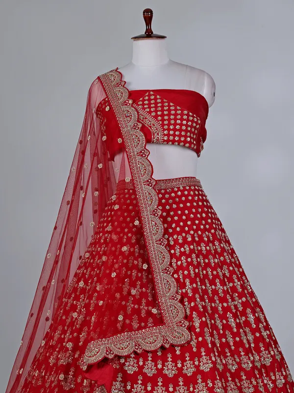 Red raw silk bridal lehenga choli with thread work