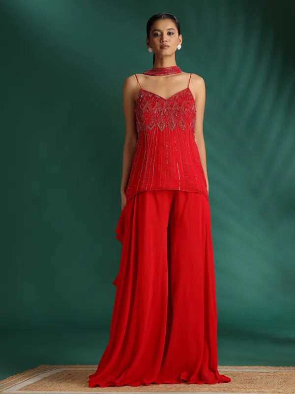 Red palazzo suit with cutdana embellishments
