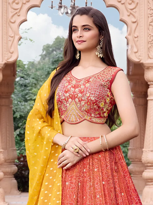 Red silk bandhej print lehenga choli with stones work