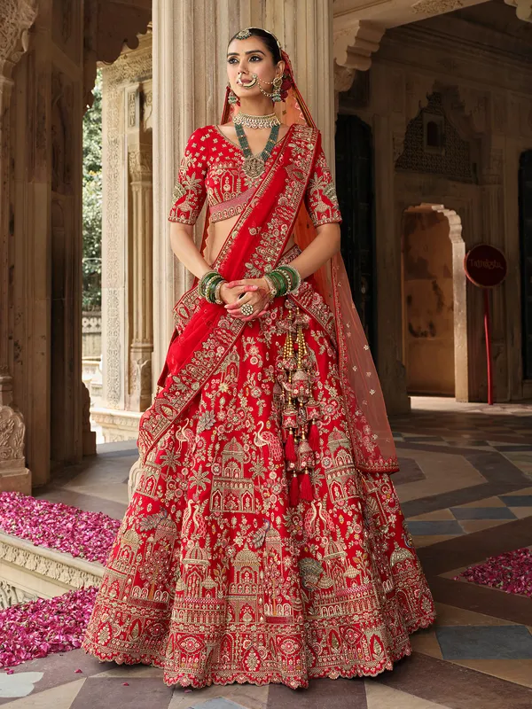Red silk bridal lehenga choli with elegant sequins detailing