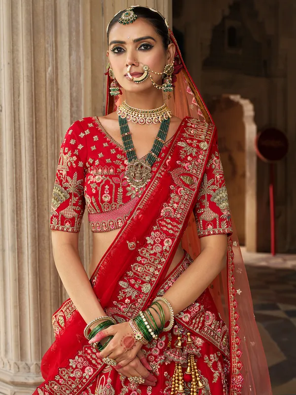 Red silk bridal lehenga choli with elegant sequins detailing
