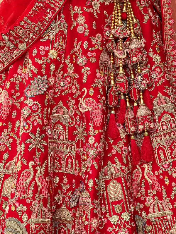 Red silk bridal lehenga choli with elegant sequins detailing
