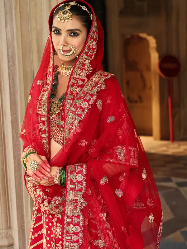 Red silk bridal lehenga choli with sequins and diamond work