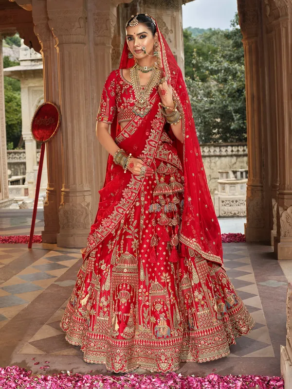 Red silk bridal lehenga choli with sequins embellishment