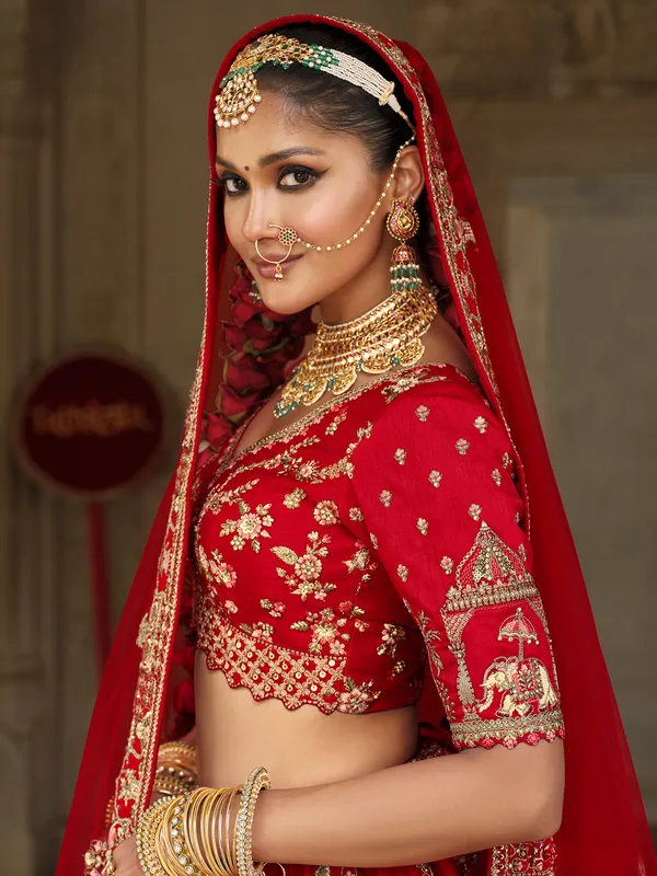 Red silk lehenga choli for bride with sequins work