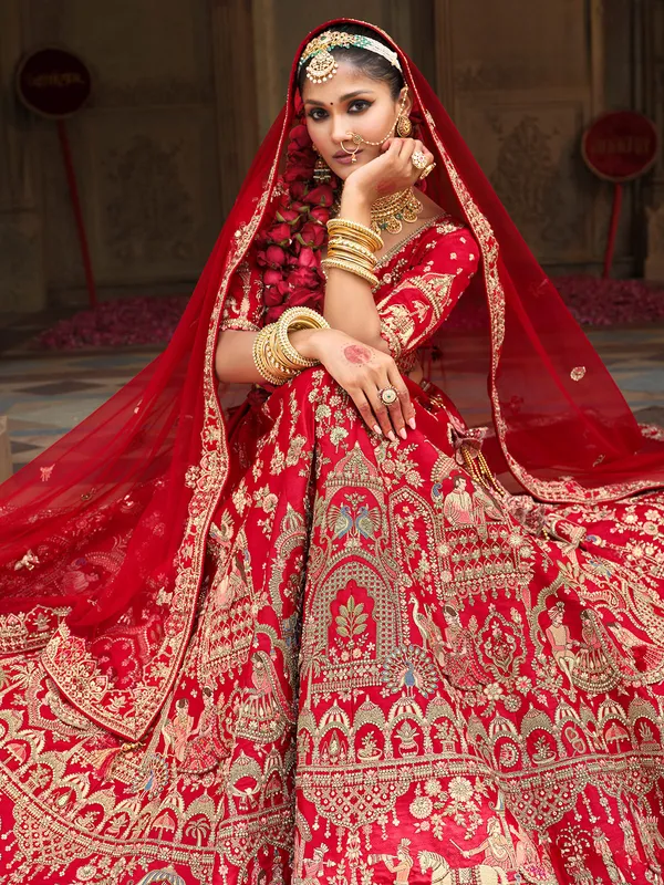 Red silk lehenga choli for bride with sequins work