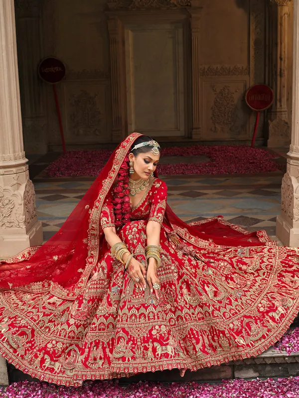 Red silk lehenga choli for bride with sequins work