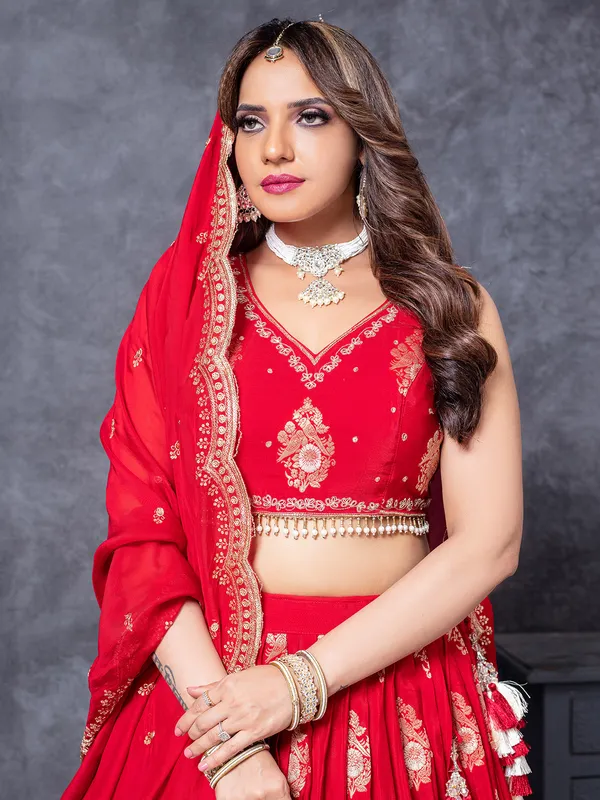 Red silk lehengac choli with zardosi embellishment