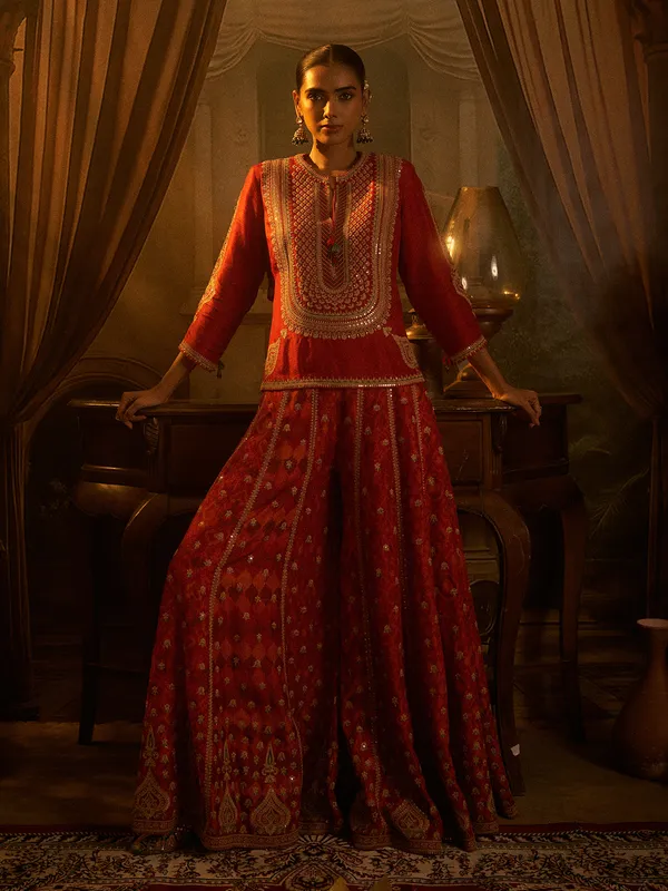 Red silk palazzo suit for wedding celebration