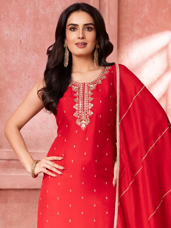 Red silk salwar suit with resham and sequins work