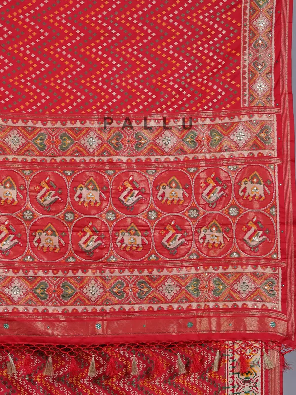 Red silk saree with colorful motifs