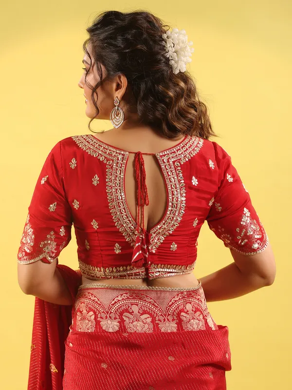Red silk saree with zari shine for wedding look