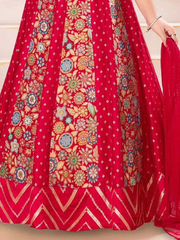Red silk wedding wear gown with zari glow for girls