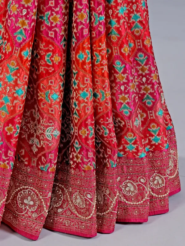 Red silk wedding wear saree with colorful motif