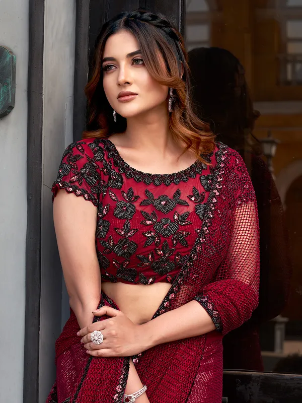 Red soft net saree with sparkle hand finish