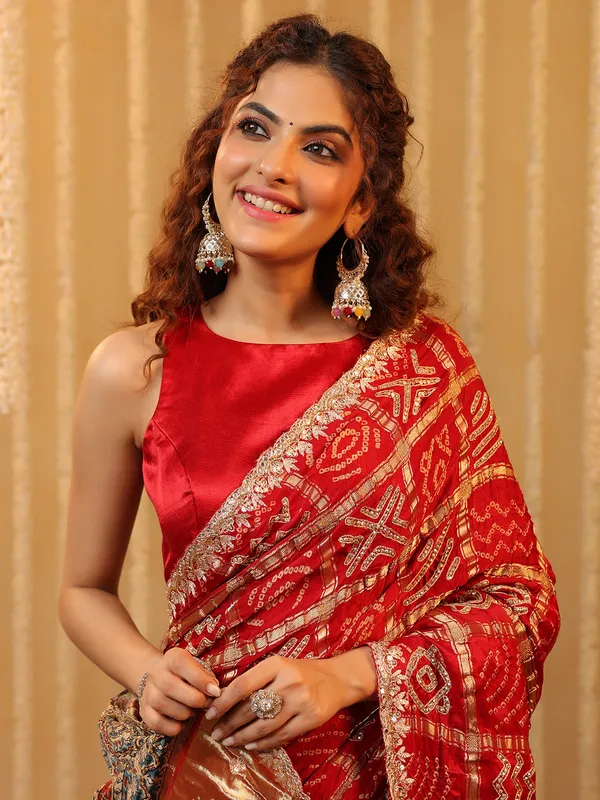 Red wedding wear bandhej silk saree with print