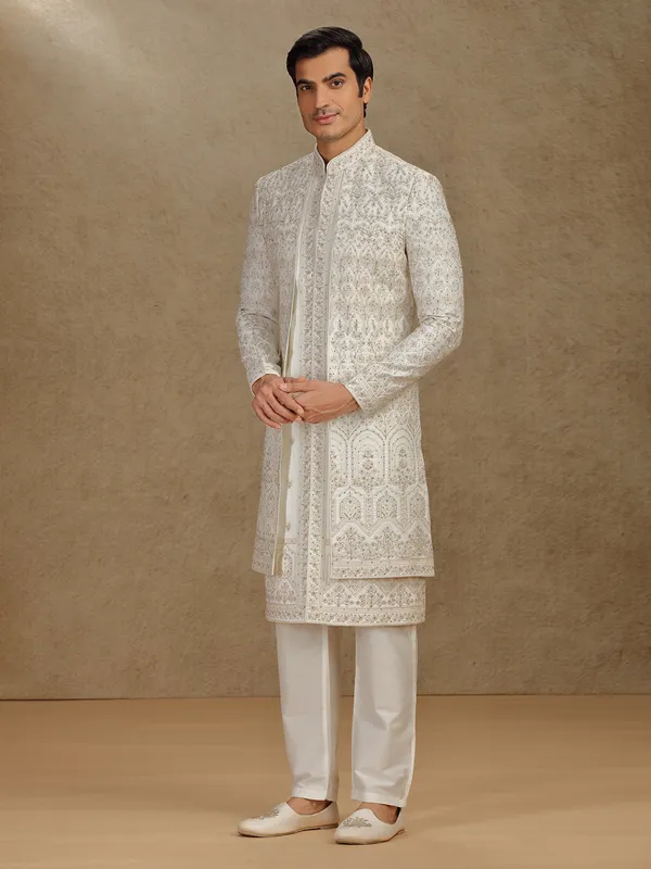 Regal cream silk sherwani with embroidery accents