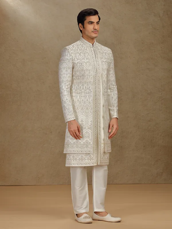 Regal cream silk sherwani with embroidery accents