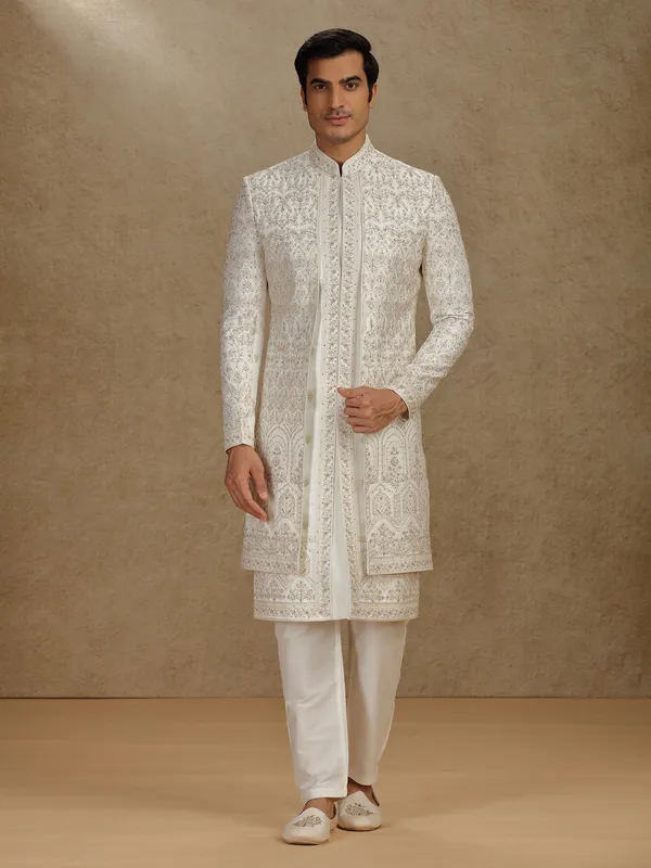Regal cream silk sherwani with embroidery accents
