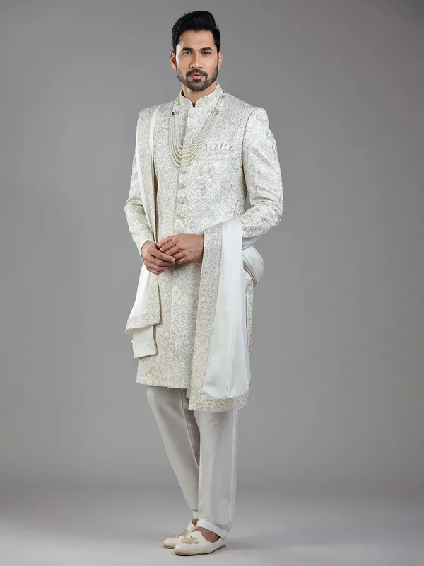 Regal grace in cream silk with ornate resham and sequins detailing