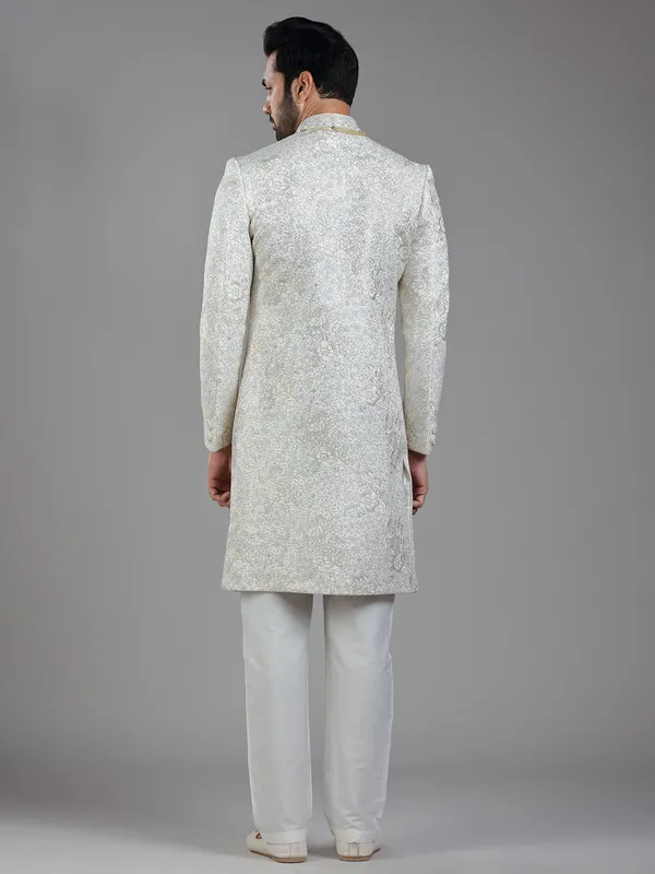 Regal grace in cream silk with ornate resham and sequins detailing